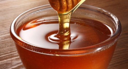 How does perforated metal help with honey production?